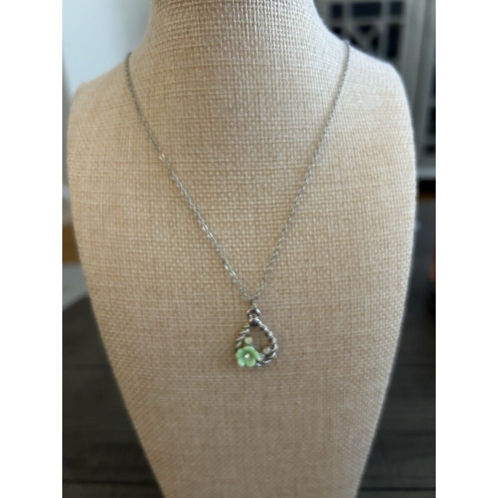 Necklace With Oval Silver Flower Pendant